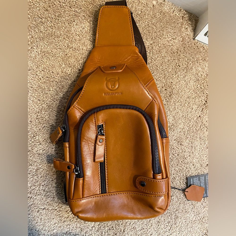 Bullcaptain Leather Sling Backpack with USB charging port.